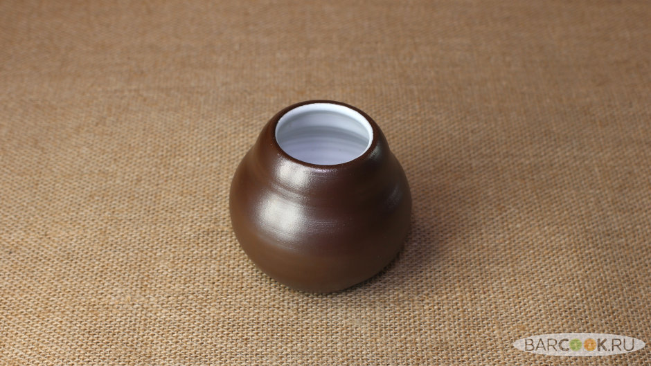 Глиняный калабас ручной работы в виде тыквы.